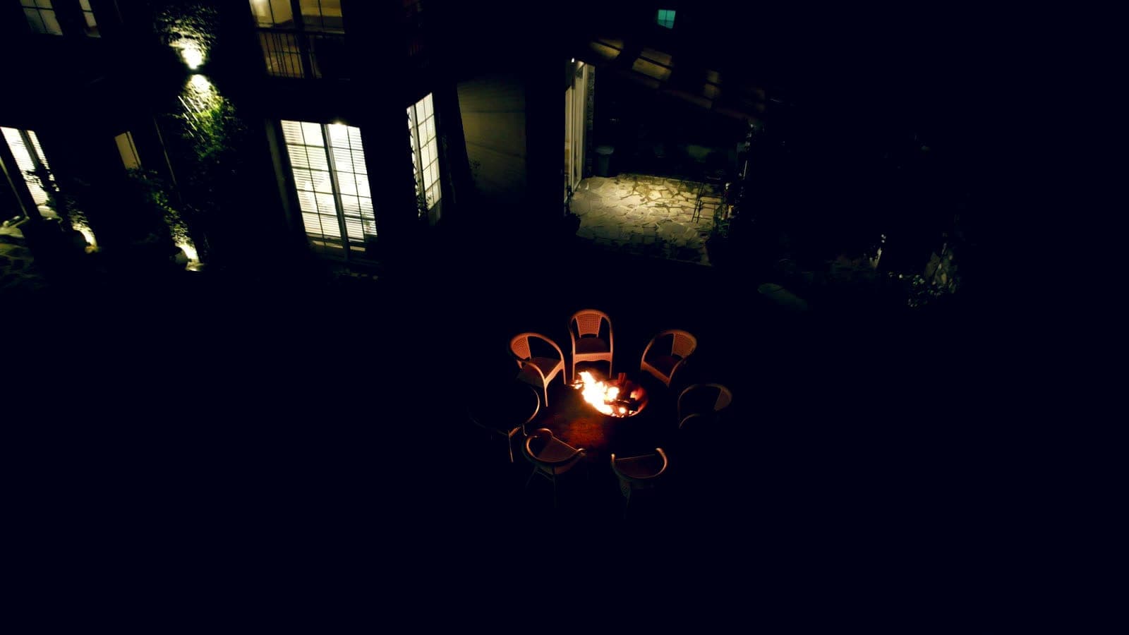 Evening bonfire on the cottage lawn